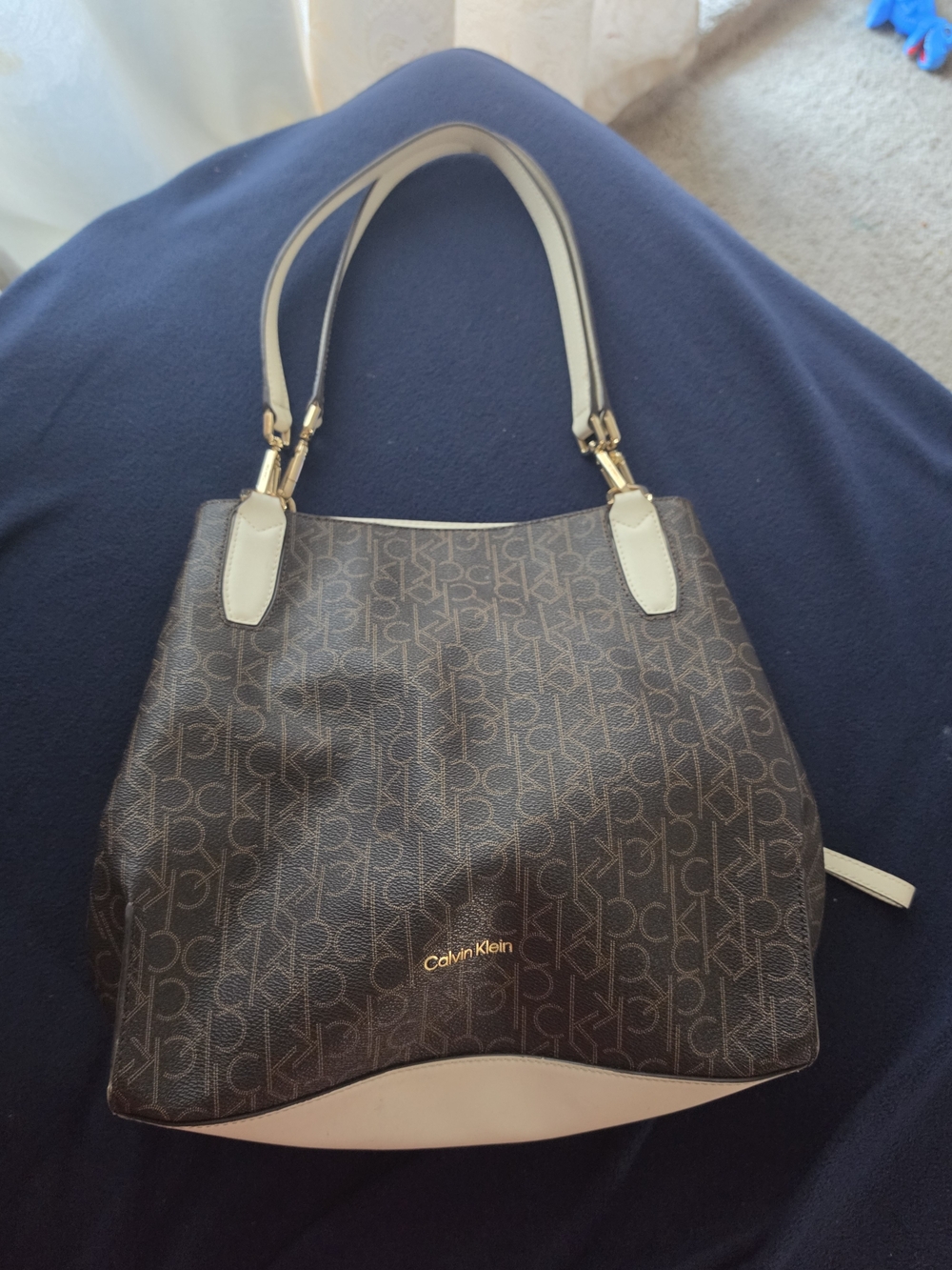 Calvin Klein Brown Monogram Tote with Cream Trim Has A Defects From Bad Storage